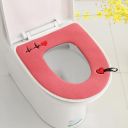 A charming toilet seat cover - red