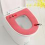 A charming toilet seat cover - red