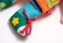 A cuddly toy / doll to dress - double-sided