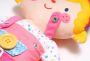 A cuddly toy / doll to dress - double-sided