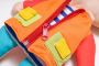 A cuddly toy / doll to dress - double-sided