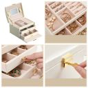 A multi-level casket, a jewelery box - beige