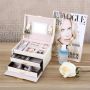 A multi-level casket, a jewelery box - beige