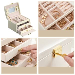 A multi-level casket, a jewelery box - beige, crocodile skin pattern