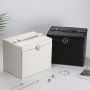 A multi-level casket, a jewelery box - black