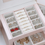 A multi-level casket, a jewelery box - black