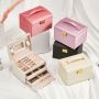 A multi-level casket, a jewelery box - black