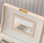 A multi-level casket, a jewelery box - gold