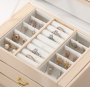 A multi-level casket, a jewelery box - gold
