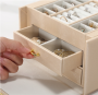 A multi-level casket, a jewelery box - gold