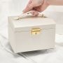 A multi-level casket, a jewelery box - white