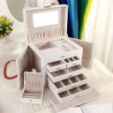 A multi-level casket, a jewelery box - white