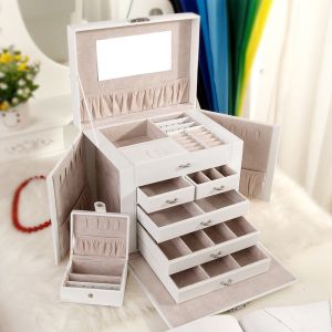 A multi-level casket, a jewelery box - white