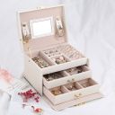 A multi-level casket, a jewelery box - white