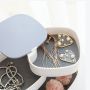 A multi-level jewelery box - white