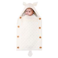 A sleeping bag for a stroller with rabbit ears - white