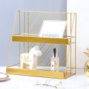 A two-tier shelf for cosmetics - gold