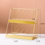 A two-tier shelf for cosmetics - gold