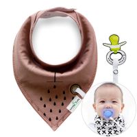 Brown shawl / bib with a pacifier hanger