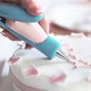 Confectionery sleeve for decorating cakes and cakes