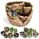 Decorative flower pot with a landscape - a house in the mountains