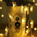 Decorative LED chain in the form of photo clips - warm white light