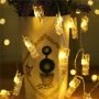 Decorative LED chain in the form of photo clips - warm white light