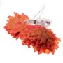 Decorative LED lamps in the shape of a maple leaf - red