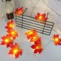 Decorative LED lamps in the shape of a maple leaf - red