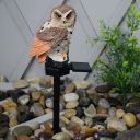 Decorative LED solar lamp for the garden Owl - brown