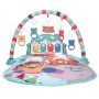 Educational mat for babies with a piano - green