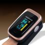 Finger pulse oximeter - black and gold