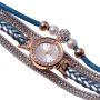 Gold watch with a blue bracelet, strap wrapped