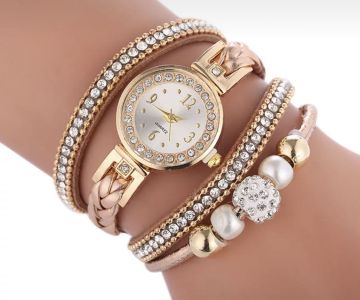 Gold watch with a bracelet, strap wrapped