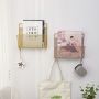 Hanging newspaper holder - golden