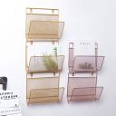Hanging newspaper holder - golden