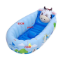 Inflatable baby bathtub with balls - shape of a cow