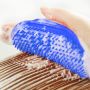 Massage brush for a dog - green