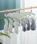 Plastic foldable clothes hanger with clips - 14 clips - green