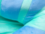 Plush child seat pink brown - blue green