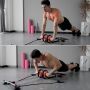 Roller with a base for exercising the abdominal muscles - black