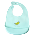 Silicone bib with a pocket for children - mint, banana pattern