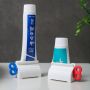 Toothpaste tube squeezer - red