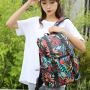 Travel backpack with space for a laptop - colourful leaves