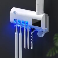 UV toothbrush holder with a paste dispenser - white